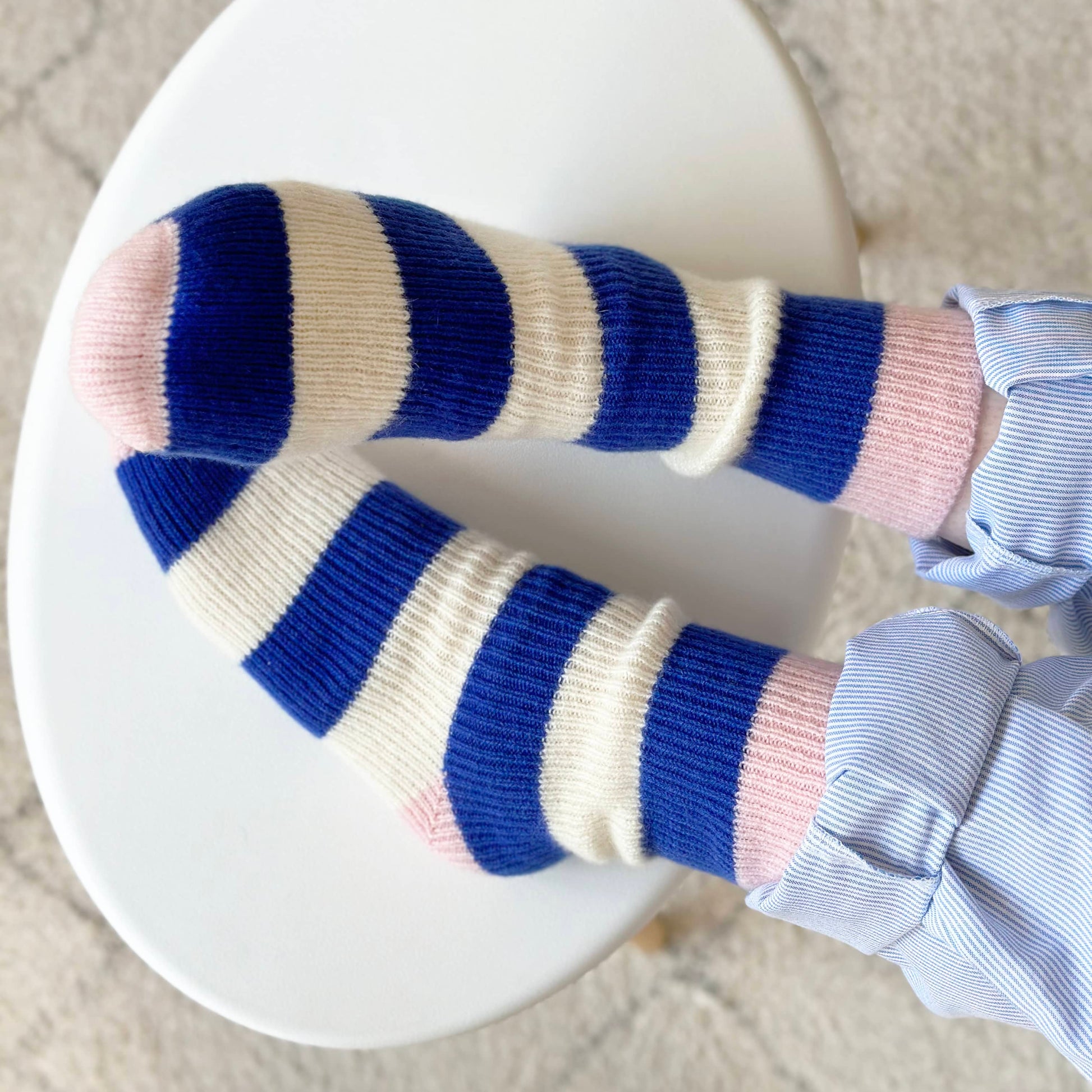100% cashmere socks.  Handmade socks in pure cashmere.  Blue and white stripe fun socks.  Knitted socks in cashmere.  Pink rib and heel socks with blue and cream stripes.