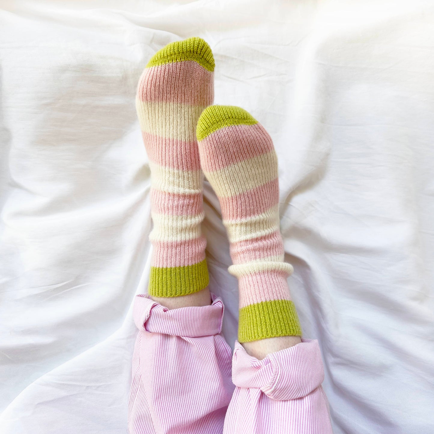 100% pure cashmere socks, fun bright bold design with stripes in pink and cream. Handmade socks by Cashmere Party.