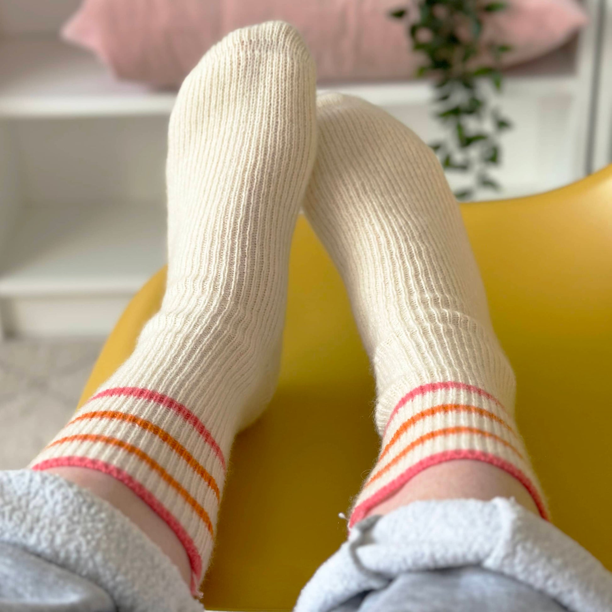 100% cashmere sport socks handmade by Cashmere Party.  Orange and coral sport stripes on thick ribbed cashmere socks.
