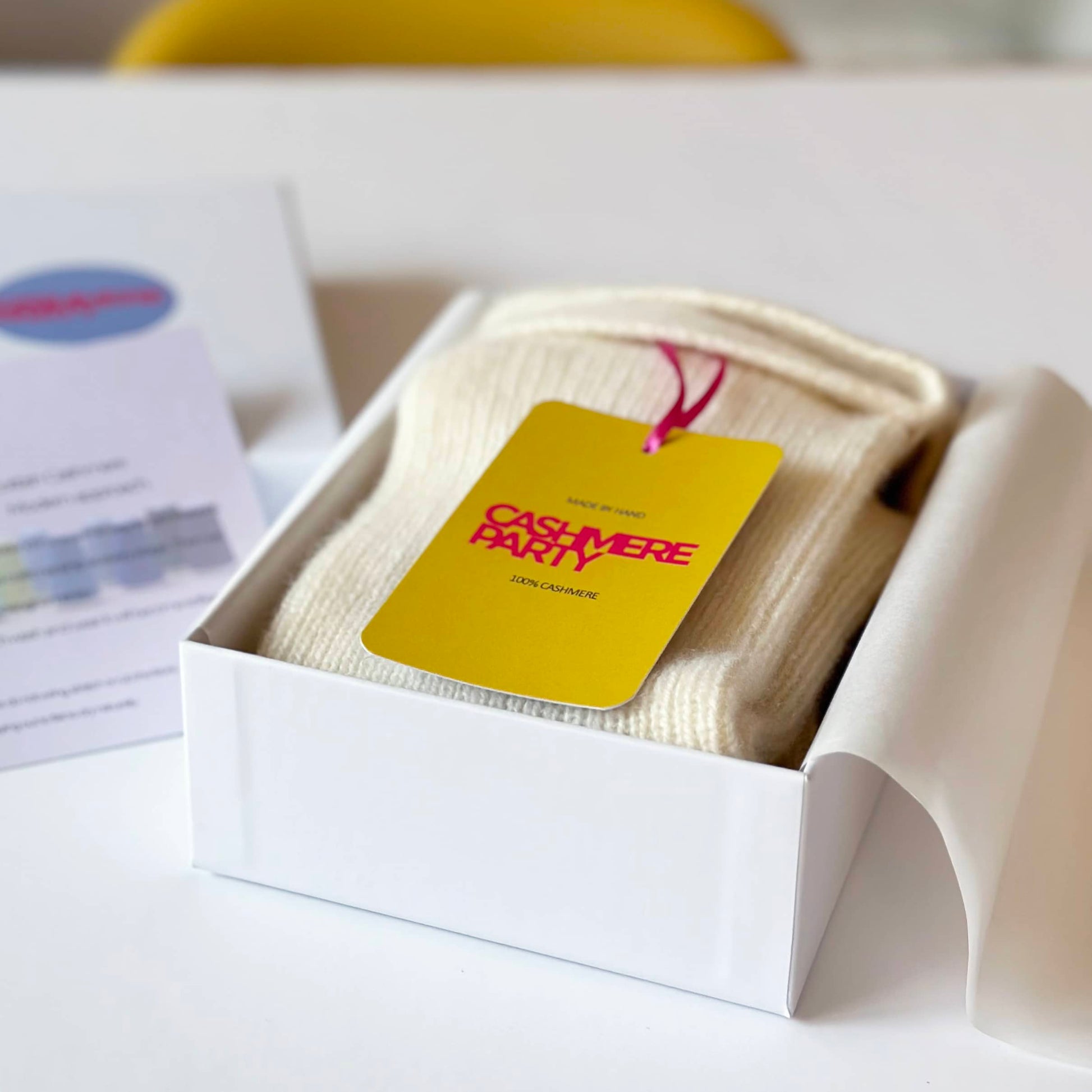 100% pure cashmere handmade socks in gift box with branded swing ticket.