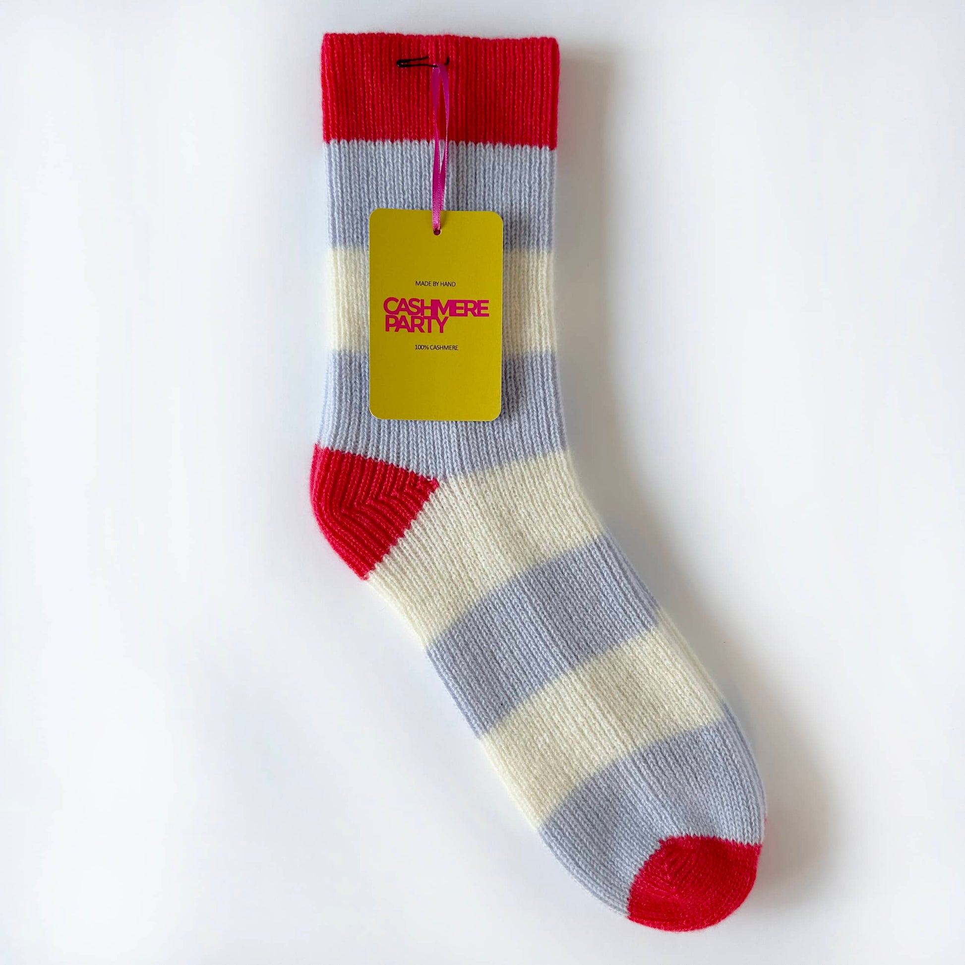 100% cashmere sock by Cashmere Party.  Handmade sock with bold stripes in light blue, cream and red.  With branded swing ticket.