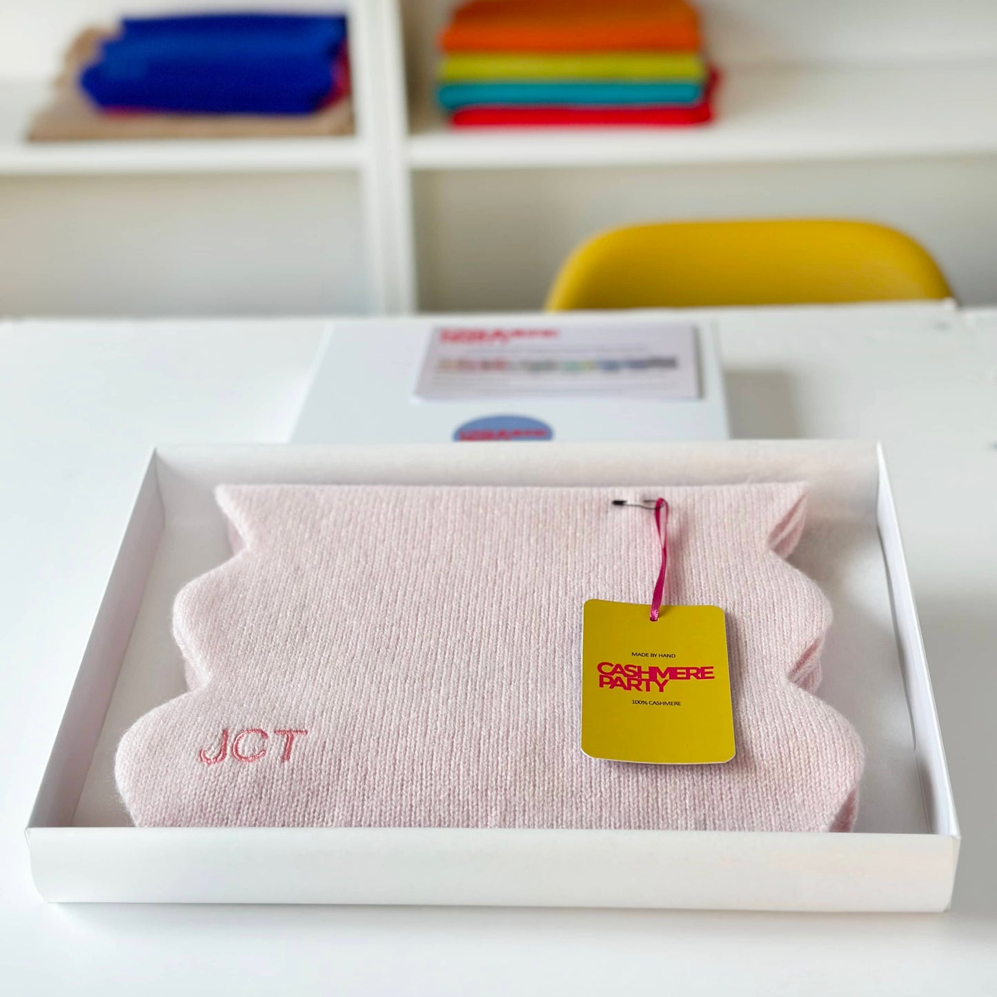 Light Pink pure cashmere scarf in gift box with branded swing ticket.  Scallop edge personalised scarf in gift box.