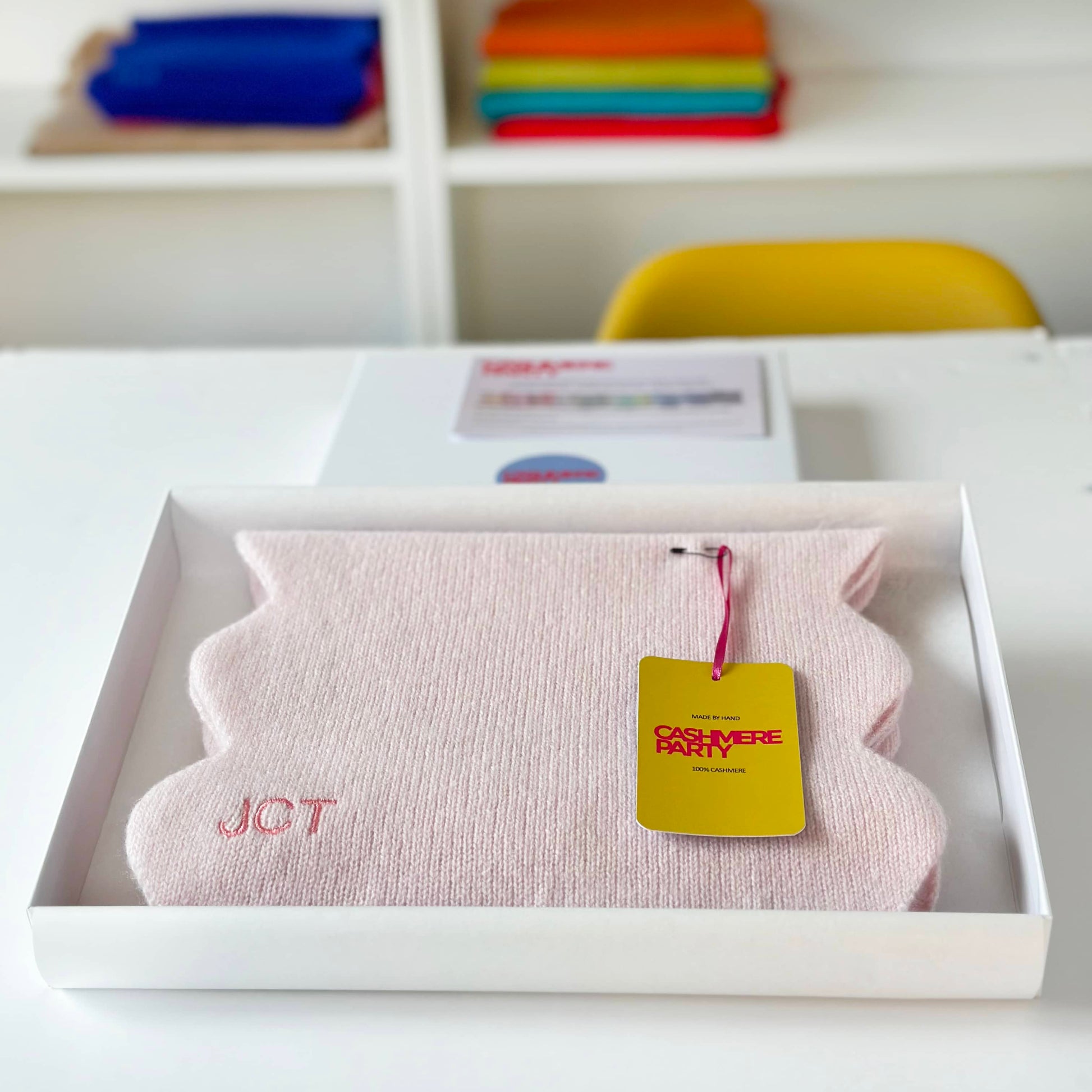 Light Pink pure cashmere scarf in gift box with branded swing ticket.  Scallop edge personalised scarf in gift box.
