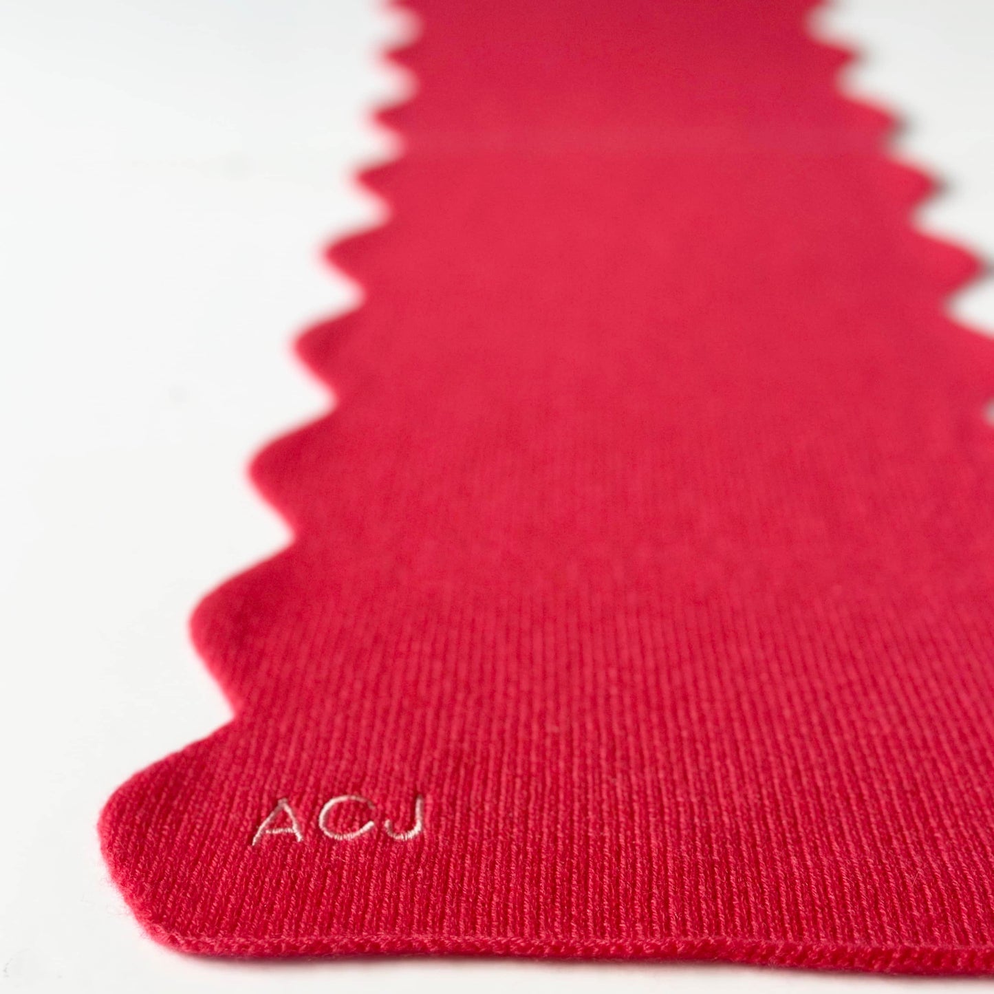 Handmade knitted cashmere scarf with scallop edge.  Warm soft luxury cashmere scarf with embroidered personalisation by Cashmere Party.