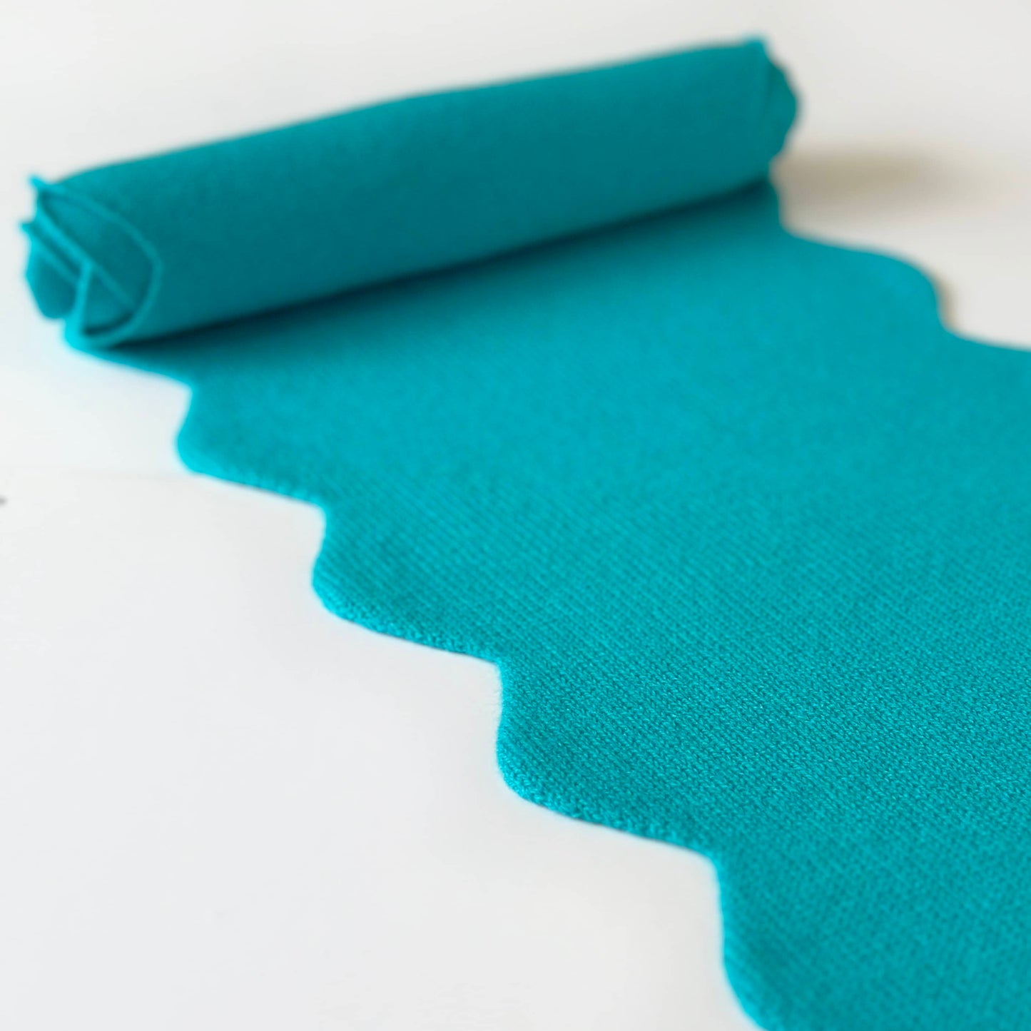 Luxury pure cashmere scarf in turquoise colour with scallop edges.