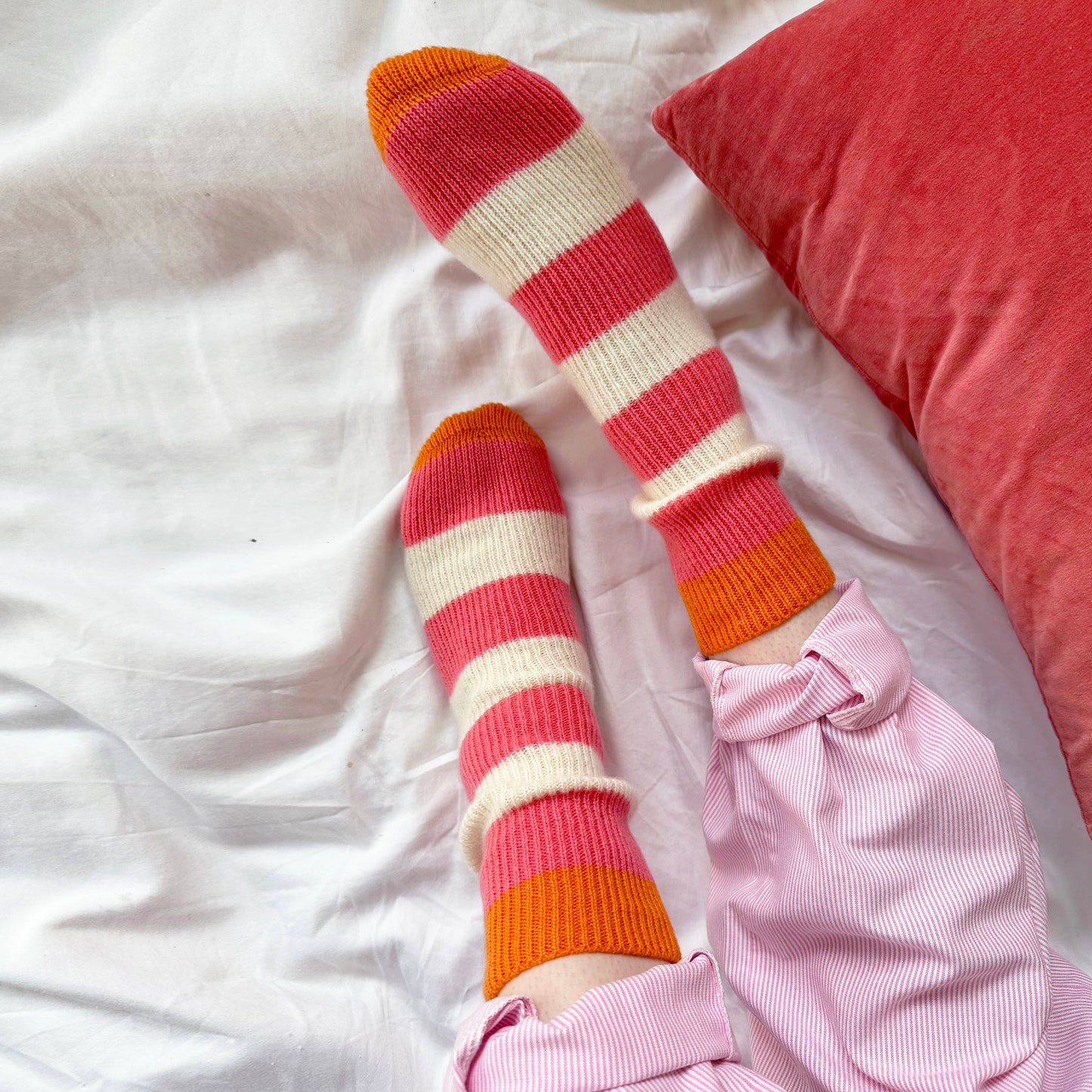 Handmade chunky cashmere socks by Cashmere Party.  Coral and Cream stripes with orange heel and toe.  100% cashmere bed socks.