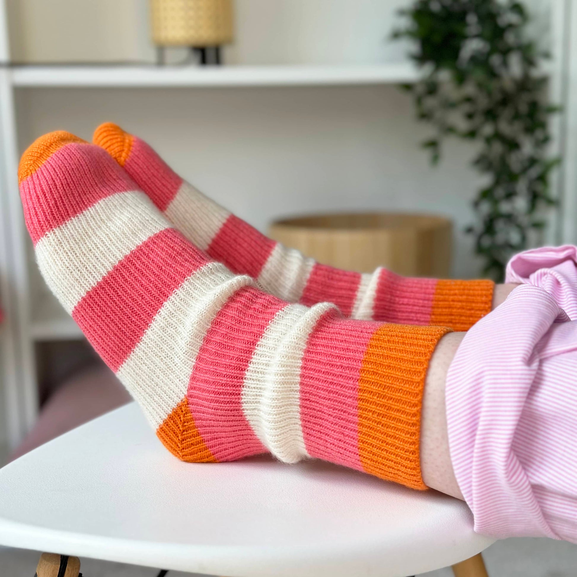 100% cashmere socks by Cashmere Party.  Handmade cashmere socks.  Bright fun bold stripes in Coral Orange and Cream colour.  Modern chunky cashmere socks.