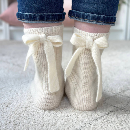 100% cashmere socks by Cashmere Party.  Handmade cashmere socks with big bow on the back.  Chunky modern cashmere socks with bow.