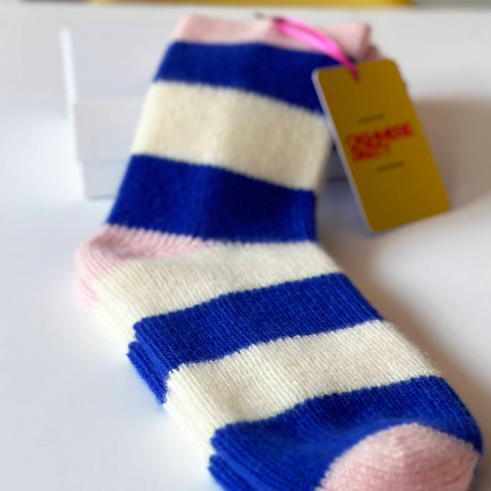 100% cashmere sock close up.  Handmade socks, blue and cream stripe socks.  Fun modern bright colourful cashmere socks by Cashmere Party.