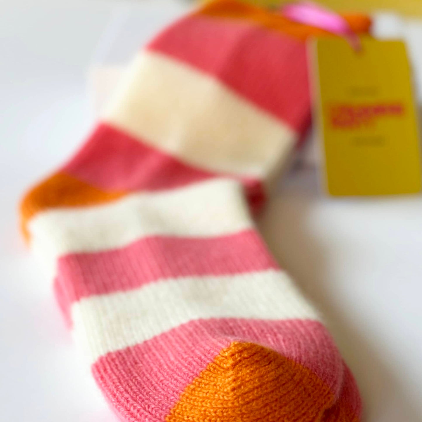 Close up of 100% cashmere socks by Cashmere Party.  Bright modern fun cashmere socks.  Handmade socks.