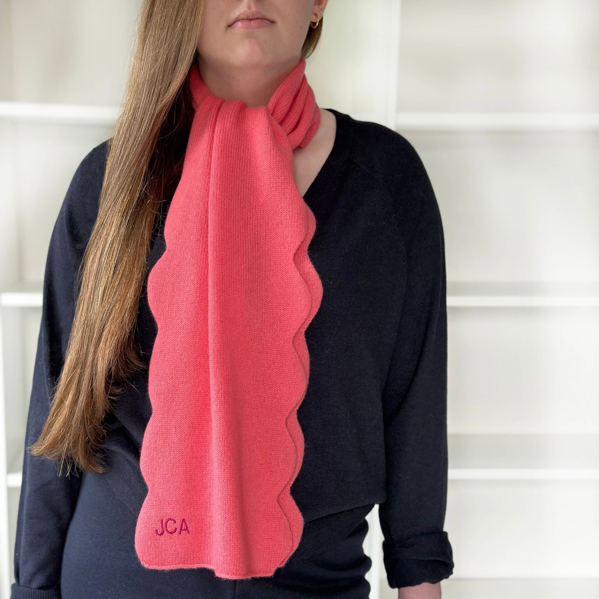 scallop edge cashmere scarf by cashmere party.  Personalised cashmere scarf on women, coral colour 100% cashmere handmade scarf.