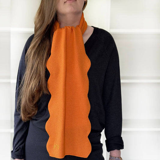 Luxury cashmere scarf with scallop edges by Cashmere Party.  Modern fun cashmere handmade.  Scarf with personalisation on woman.