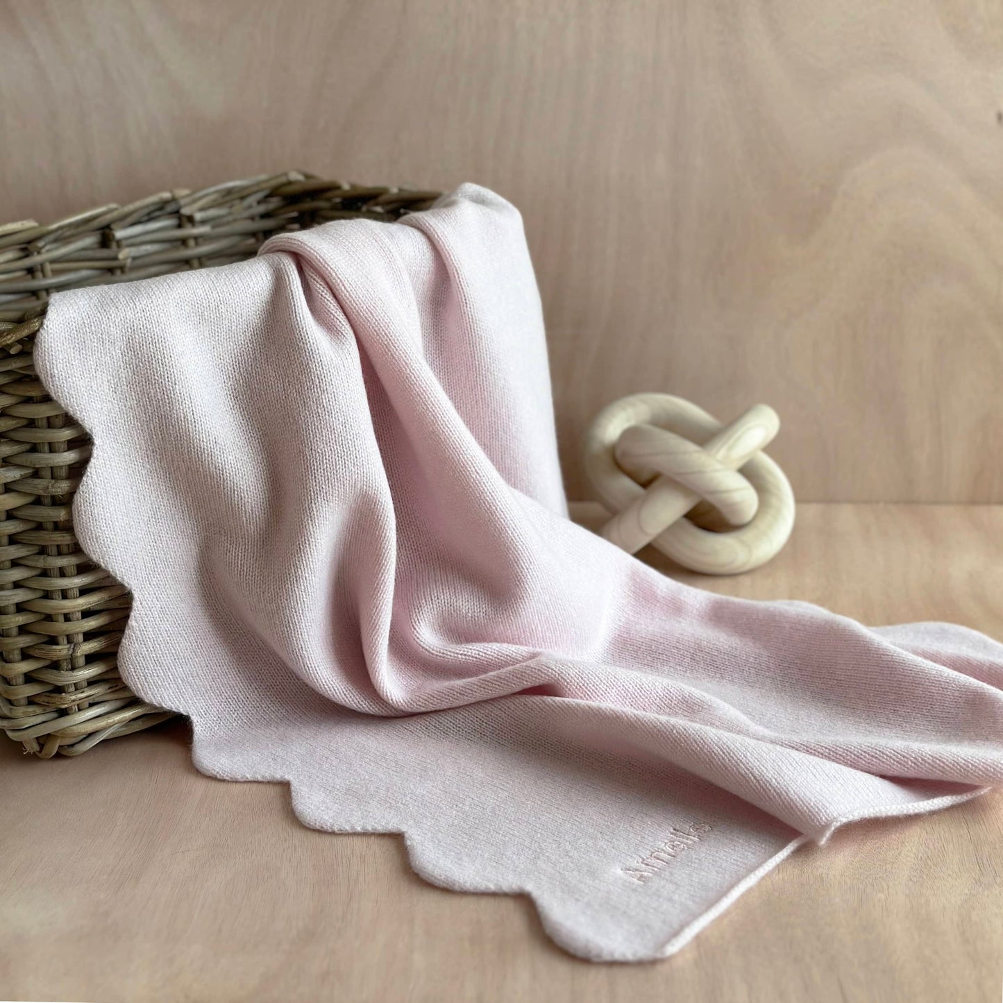 Pure cashmere handmade baby blanket gift.  With scalloped edge detail and embroidered personalisation by Cashmere Party.