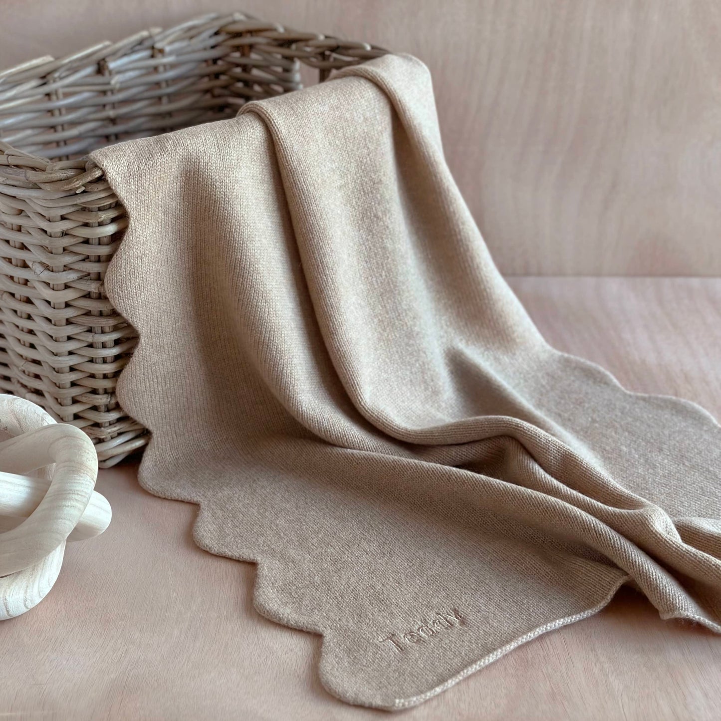 Scallop edge personalised baby blanket gift in pure cashmere.  Light beige colour baby blanket with scallop edge detailing new baby gift.